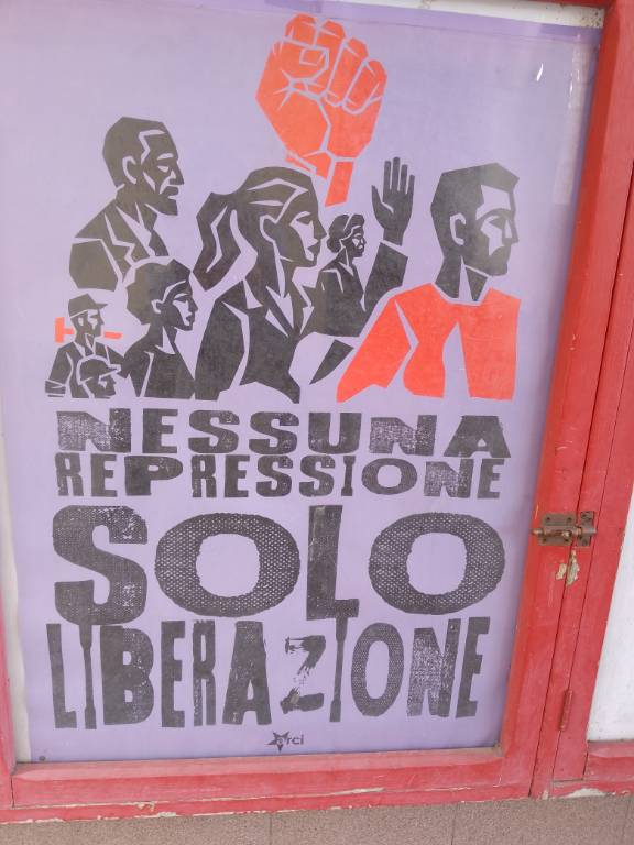 Poster on a wall in Fiesole reading “Nessuna repressione, solo liberazione”